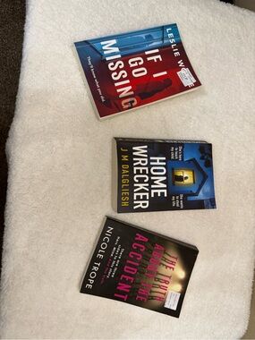 Assorted Paperback Mystery Books - Red, Blue, Black Covers